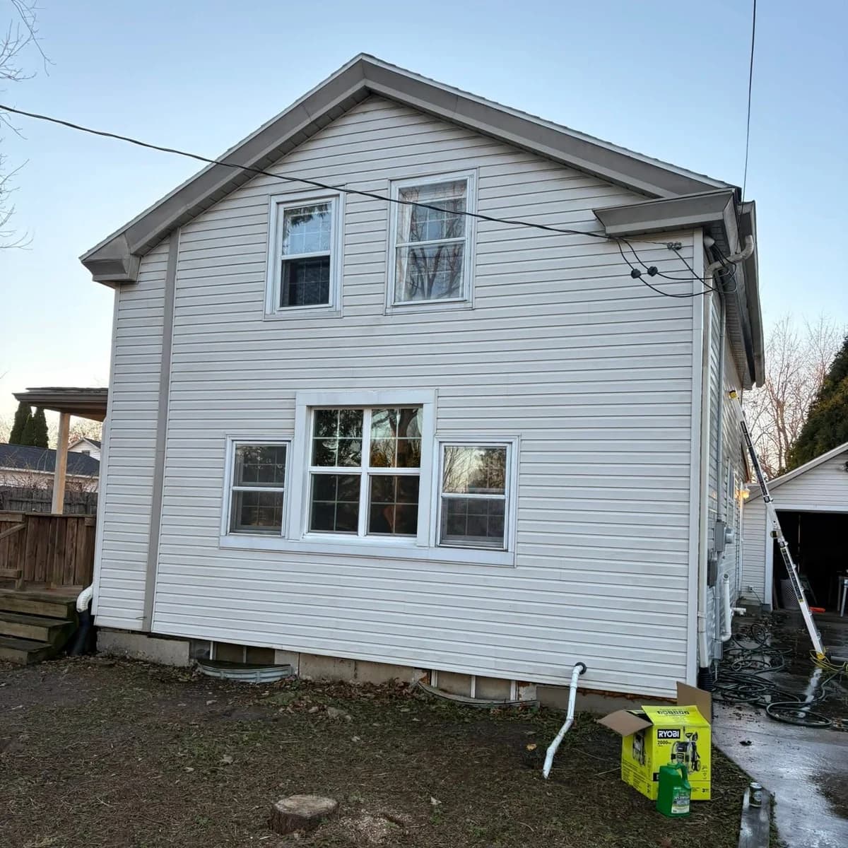 The same home with the siding clean and even after a Kussmaul Co. soft wash
